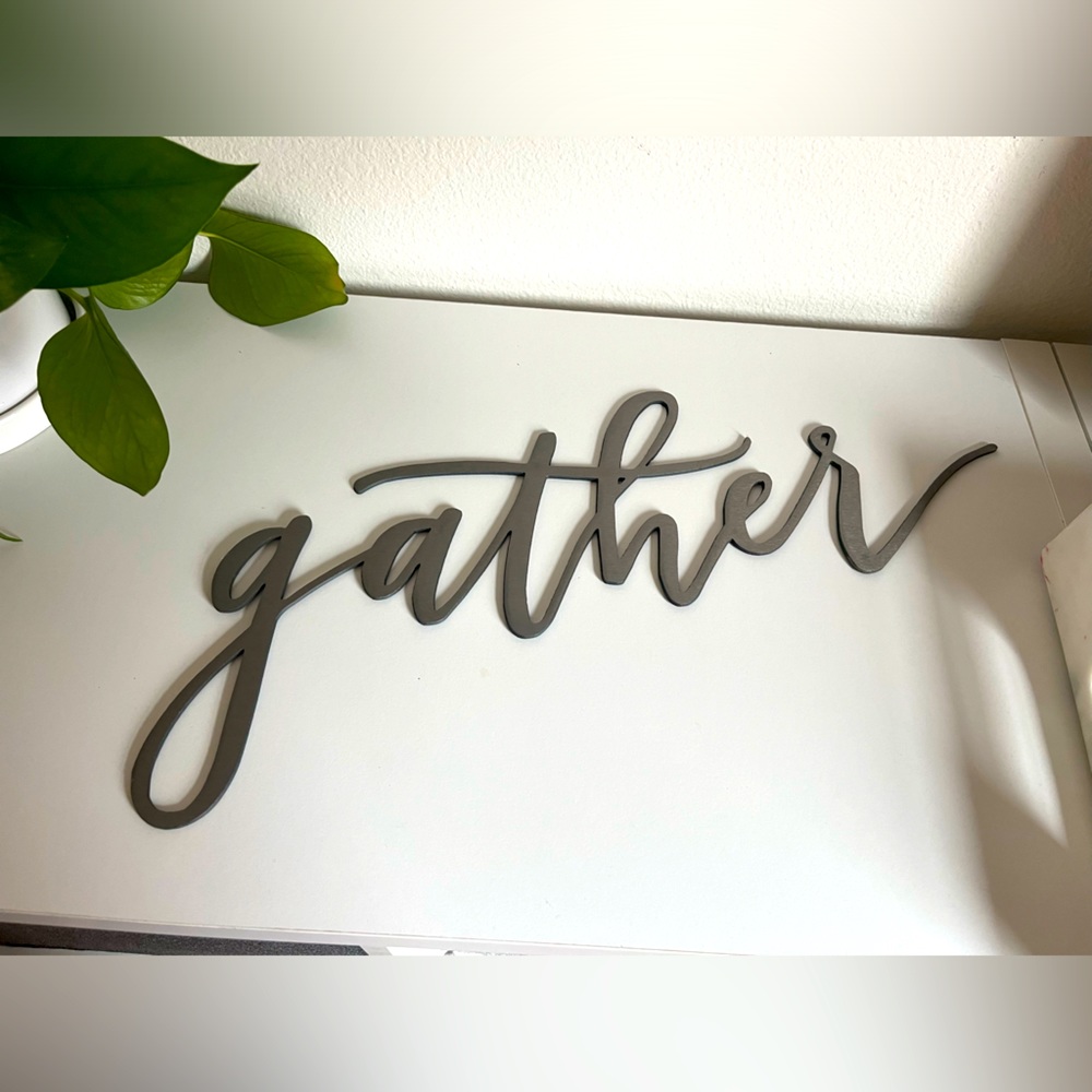 Metal “gather” sign from Magnolia line